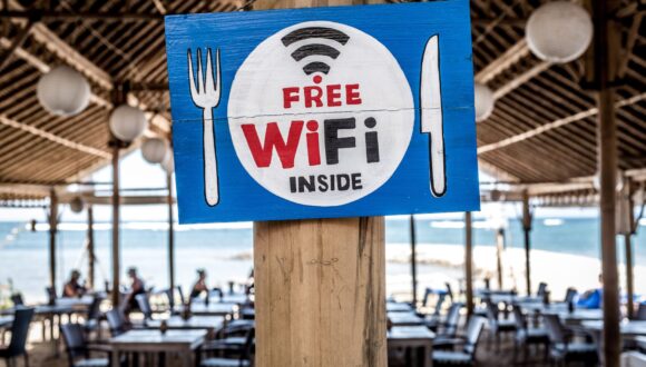 Free WiFi inside restaurant sign.